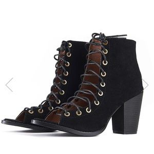 Black “suede” lace up front style booties